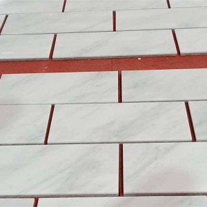 Azulejos de mármol blanco del este
