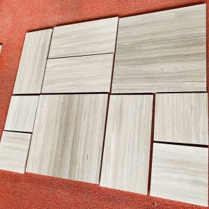 Azulejos de mármol de madera blanca